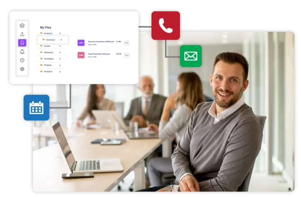 A man smiling at the camera with business partners chatting in the background due to increased time from better systems and automation from BlueMarket Systems